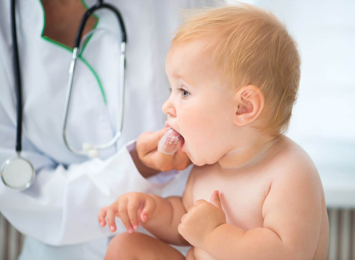 Baby Grinding Teeth Causes, Symptoms & Solutions