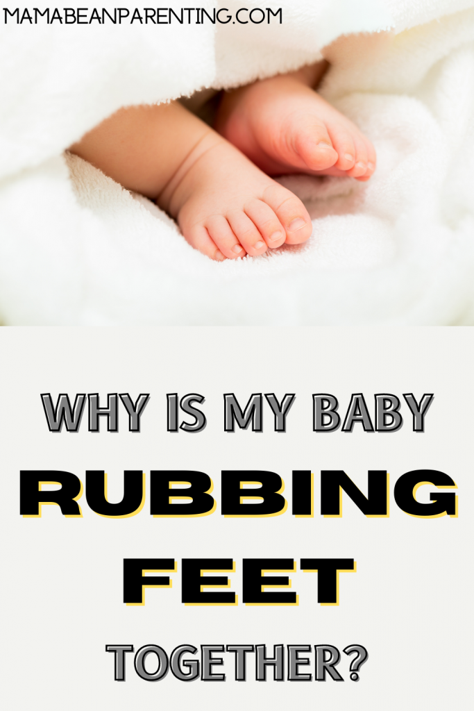 baby rubbing feet together