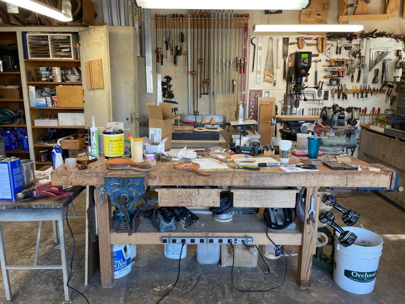 Workbench Cluttered with Tools