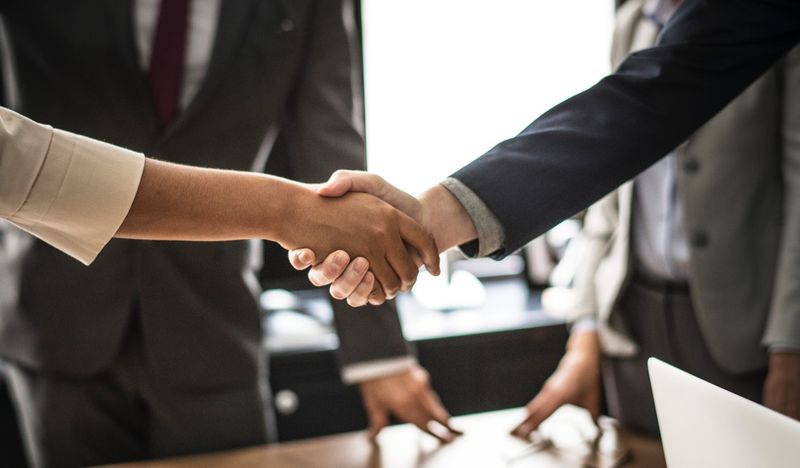 Greeting with a Firm Handshake