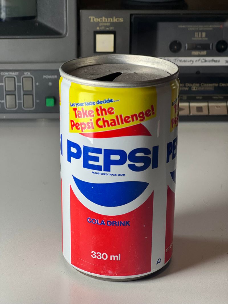 Freshly Opened Cans of Soda